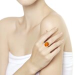 Кольцо из золочёного серебра с коричневым янтарём (пресс.)
