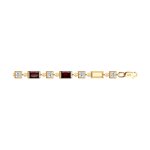 Браслет из золота с гранатами и Swarovski Zirconia